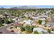Scenic aerial view of a neighborhood with mature trees and beautiful mountain backdrop at 6111 N 8Th St, Phoenix, AZ 85014