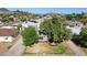 Scenic aerial view showcasing a home with mature trees and landscaping in a neighborhood at 6111 N 8Th St, Phoenix, AZ 85014