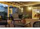 Covered back patio featuring comfortable seating and stylish decor, perfect for outdoor relaxation at 6111 N 8Th St, Phoenix, AZ 85014