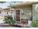 Charming front entrance with mature landscaping and a quaint bench at 6111 N 8Th St, Phoenix, AZ 85014