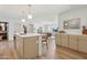 Open-concept kitchen with spacious countertops and seamless flow into the living area at 6111 N 8Th St, Phoenix, AZ 85014