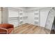Bright and spacious walk-in closet with ample storage space and a mirrored door at 6111 N 8Th St, Phoenix, AZ 85014
