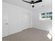 Bedroom featuring carpet, a closet, and a window offering natural light at 6610 N 15Th Ave, Phoenix, AZ 85015