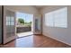 Bedroom with French doors to patio and natural light from window at 8010 W Adam Ave, Peoria, AZ 85382