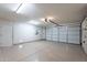 Spacious garage with ample storage and epoxy floors at 8010 W Adam Ave, Peoria, AZ 85382