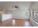 Living room features wood floors, neutral colors, and lots of natural light at 8010 W Adam Ave, Peoria, AZ 85382