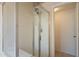 Shower stall with glass doors and chrome fixtures at 8010 W Adam Ave, Peoria, AZ 85382