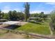 Aerial view of property, including horse facilities and pool at 944 E Melody Dr, Gilbert, AZ 85234