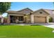 Charming single-story home featuring a well-manicured lawn and inviting curb appeal in a sunny neighborhood at 1115 E Locust Dr, Chandler, AZ 85286
