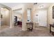 Welcoming foyer leading to a home office with neutral colors and an open floor plan at 1115 E Locust Dr, Chandler, AZ 85286