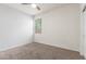Cozy bedroom featuring a ceiling fan and a bright window inviting warm natural light at 1239 E Elaine St, Casa Grande, AZ 85122