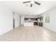 Spacious kitchen featuring dark wood cabinets, stainless appliances and tile flooring at 1239 E Elaine St, Casa Grande, AZ 85122