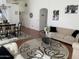 Open living room offering comfortable seating and a dining area for gatherings at 13031 W Surrey Ave, El Mirage, AZ 85335
