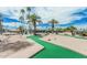 Charming mini-golf course surrounded by lush landscaping, provides a fun and relaxing recreational activity for residents at 13821 N Thunderbird Blvd, Sun City, AZ 85351