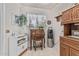 Cozy office nook with a vintage desk and charming decor creates a functional and inviting workspace within the home at 13821 N Thunderbird Blvd, Sun City, AZ 85351