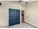 Spare bedroom with standard closet and ceiling fan at 14282 W Indianola Ave, Goodyear, AZ 85395