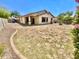 Backyard featuring a patio, lawn, and garden, offering a versatile outdoor space for relaxation and entertainment at 1516 E Azalea Dr, Gilbert, AZ 85298