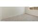 Minimalist bedroom design, carpet flooring, bright interior at 15656 W Mercer Ln, Surprise, AZ 85379
