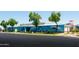 Exterior view of the Surprise Aquatic Center building with colorful ocean life themed murals along the facade at 15656 W Mercer Ln, Surprise, AZ 85379