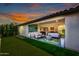 Cozy patio overlooking the pristine turf, adjacent to a gourmet kitchen and indoor living spaces at 17168 W Mountainair St, Surprise, AZ 85388