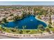 An aerial view of a large Personal made lake surrounded by residential homes and landscaping at 1754 W San Tan St, Chandler, AZ 85224