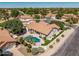 Aerial view of a single Gathering home featuring a private pool, mature landscaping, and located on a corner lot at 1754 W San Tan St, Chandler, AZ 85224