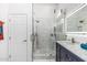 Bathroom with walk-in shower featuring white tile and granite vanity at 1754 W San Tan St, Chandler, AZ 85224
