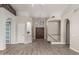 Bright foyer with beautiful flooring, arched doorways, high ceilings, and decorative accents at 1754 W San Tan St, Chandler, AZ 85224