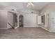 Spacious living room featuring vaulted ceiling and luxury vinyl plank flooring at 1754 W San Tan St, Chandler, AZ 85224