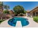 Backyard pool with diving board and outdoor cooking area at 1754 W San Tan St, Chandler, AZ 85224