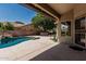 Back patio featuring private pool with built-in spa and outdoor BBQ at 1754 W San Tan St, Chandler, AZ 85224