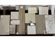 An assortment of luxury tiles and flooring options showcasing the home's design palette at 18141 E Silver Creek Ln, Queen Creek, AZ 85142