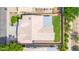 An aerial view of a home with a tile roof, green yard, and an extended driveway in a well-kept neighborhood at 1835 E Marquette Dr, Gilbert, AZ 85234
