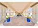 Elegant entrance featuring beautiful planters leading to a grand doorway, showcasing a welcoming and luxurious ambiance at 1835 E Marquette Dr, Gilbert, AZ 85234