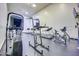 Well-equipped gym with various cardio machines and weight training equipment, offering a complete fitness experience at 1835 E Marquette Dr, Gilbert, AZ 85234