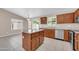 Stylish kitchen with granite countertops, ample cabinet space, and modern appliances at 1835 E Marquette Dr, Gilbert, AZ 85234
