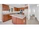 Updated kitchen with a granite island, stainless appliances, and plenty of counter space at 1835 E Marquette Dr, Gilbert, AZ 85234