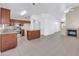 Open-concept kitchen with a center island, stainless steel appliances, and ample storage at 1835 E Marquette Dr, Gilbert, AZ 85234