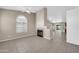 Spacious living room with a fireplace and open layout, perfect for entertaining at 1835 E Marquette Dr, Gilbert, AZ 85234