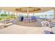 Outdoor bar featuring a spacious seating area, perfect for entertaining with views of the lake at 1835 E Marquette Dr, Gilbert, AZ 85234