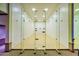 Well-maintained racquetball court with clear glass doors and professional flooring, ready for competitive play at 1835 E Marquette Dr, Gilbert, AZ 85234
