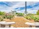 Picturesque rose garden featuring colorful blooms, walking paths, and benches for relaxing on a sunny day at 1835 E Marquette Dr, Gilbert, AZ 85234