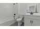 Stylish bathroom with subway tile shower, hexagon tile floor and modern vanity at 20326 W Roma Ave, Buckeye, AZ 85396