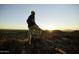 Personal enjoying scenic views from a mountaintop location at 20326 W Roma Ave, Buckeye, AZ 85396