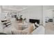 Bright living room open to kitchen, with sleek furniture and modern decor at 20326 W Roma Ave, Buckeye, AZ 85396
