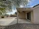 Covered patio with a ceiling fan overlooking desert landscaped backyard, great for relaxing at 2042 N Parish N Ln, Casa Grande, AZ 85122