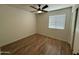 Spacious bedroom with modern fan and window at 2042 N Parish N Ln, Casa Grande, AZ 85122