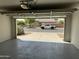 View from the garage showcasing the driveway and neighborhood at 2042 N Parish N Ln, Casa Grande, AZ 85122