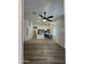 View of the living room and open kitchen with modern appliances and finishes at 2042 N Parish N Ln, Casa Grande, AZ 85122