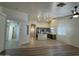 Open layout connecting the living room to the modern kitchen with stainless steel appliances at 2042 N Parish N Ln, Casa Grande, AZ 85122
